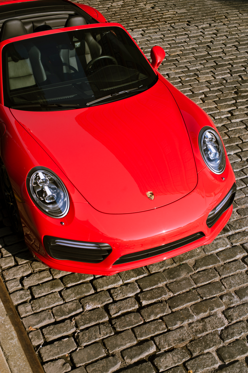 Illustration for article titled The 2018 Porsche 911 Turbo S Cabriolet Is the Best Way to Kill Hypercars and Get a Tan